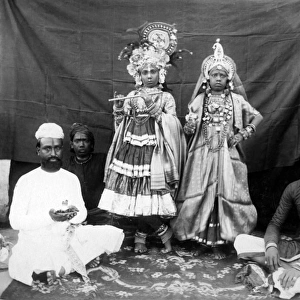 Child musicians in ornate costume, India