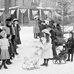 Children with dolls on sleds - Midwinter carnival children s