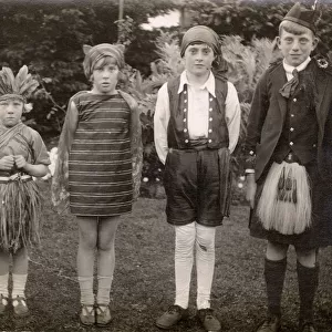 Four children in fancy dress, c. 1925