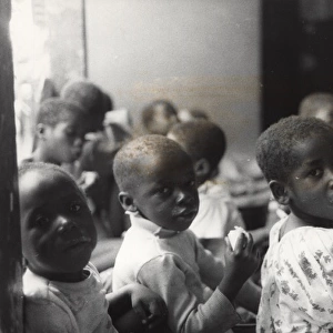 Children with food and drink, Ghana, West Africa