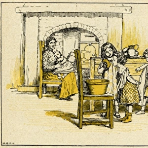 Children helping mother in the kitchen