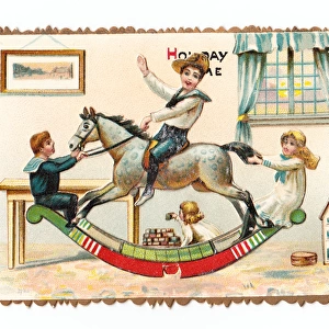 Children with rocking horse on a greetings card