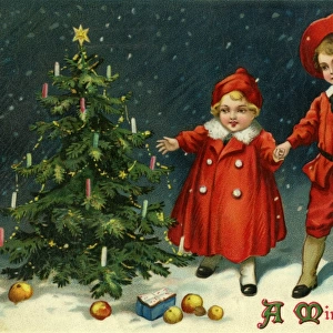 Children round a Christmas tree