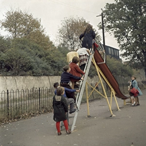 Children on a slide in a park