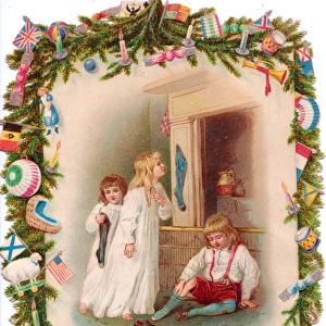 Three children and stockings on a Christmas card