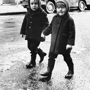 Two children walking in a Balham street, SW London