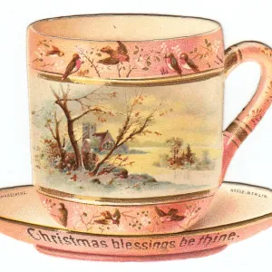 China cup and saucer on a cutout Christmas card