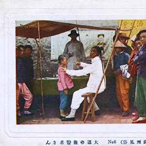 Chinese Street Doctor assessing a young patient