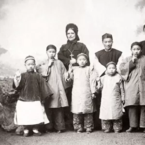 Christian missionaries and school children, China c. 1890 s