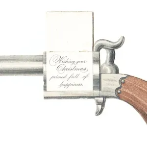 Christmas card in the shape of a gun Christmas card in the shape of a gun