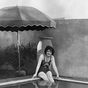Clara Bow in her swimming pool, 1928