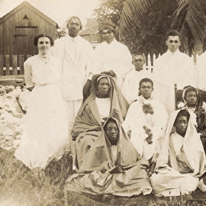 Clergyman and wife with African group