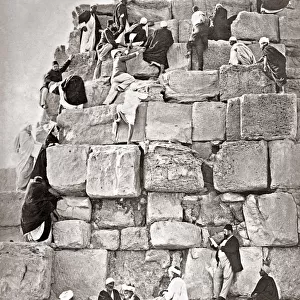 Climbing The Great Pyramid, Egypt, circa 1880s. Date: circa 1880s