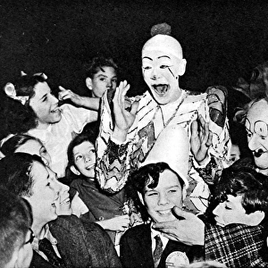 Clowns and children at the circus, 1948