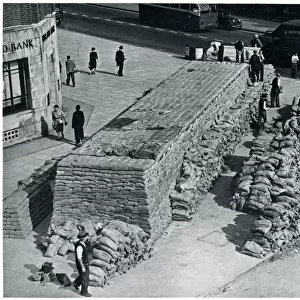Construction of sandbag air raid shelter, September 1939