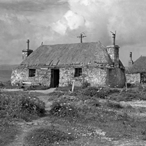 Cottage buildings in remote landscape