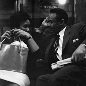 Couple on a London underground train