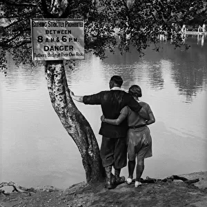 Couple standing by Keston Ponds, Kent
