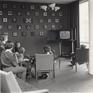 Cub Scouts watching TV at Baden Powell House, London