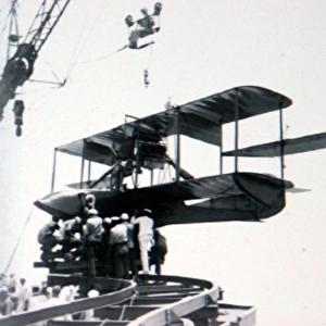 Curtiss AB-3 of the USMC being hoisted aboard USS North