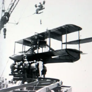 Curtiss AB-3 of the USMC being hoisted aboard USS North