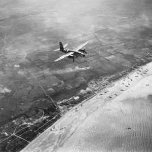 D-Day - Bomber giving air support to infantry invasion