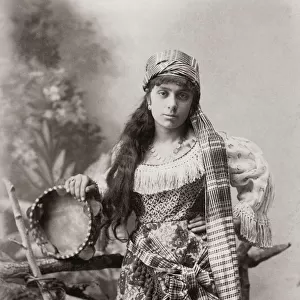 Dancer with tambourine, Egypt, c. 1890