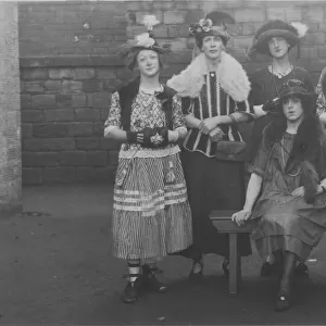 Six delightful young ladies - actually men dressed up as women