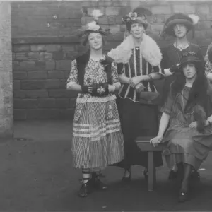 Six delightful young ladies - actually men dressed up as women