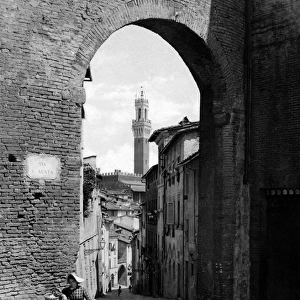 Via di Sant Agata and Torre del Mangia, Siena, Italy
