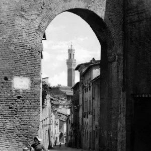 Via di Sant Agata and Torre del Mangia, Siena, Italy