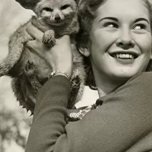 Dinah Sheridan, 16-year-old film actor, with Fennex fox