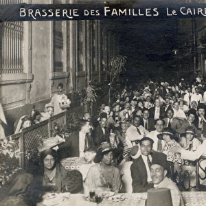 Dining families at Alfi Bey Street, Cairo