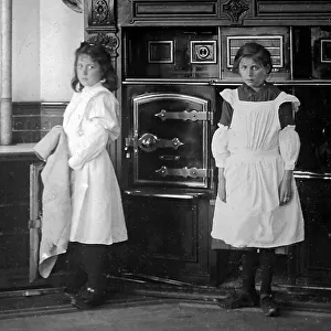 Domestic servants in a kitchen