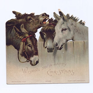 Four donkeys on a cutout Christmas card
