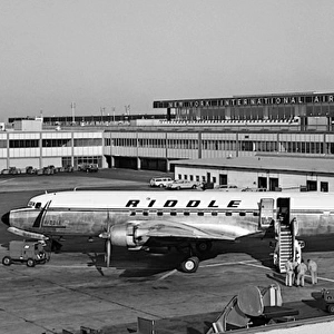 Douglas DC-7CF of Riddles N8215H at Idlewild, later JF
