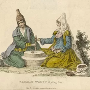 Druse women of the Lebanon grinding corn