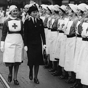 The Duchess of Gloucester inspecting nurses