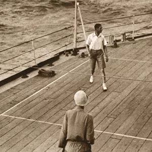 Duke and Duchess of York play Deck Tennis - HMS Renown