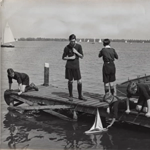 Dutch scouts with model sailing boat, Holland