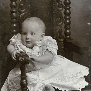 Edwardian baby in a formal chair