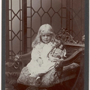 Edwardian girl with a doll