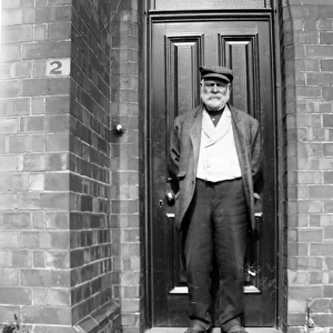 Edwardian workman on his front doorstep, Pembrokeshire
