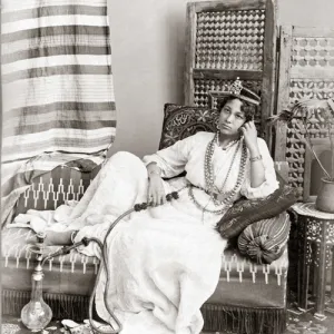 Egyptian dancer with hookah, circa 1880s