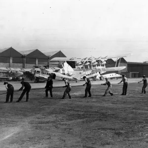 Engineers laying a new electric cable at Croydon Airport