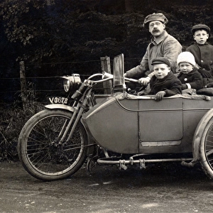 Family on a 1910 Harley Davidson motorcycle & sidecar