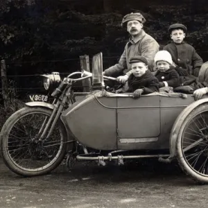 Family on a 1910 Harley Davidson motorcycle & sidecar