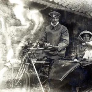 Family of three on a 1914 Twin Rex motorcycle & sidecar