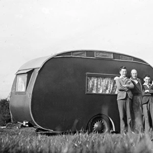 Family with caravan and car