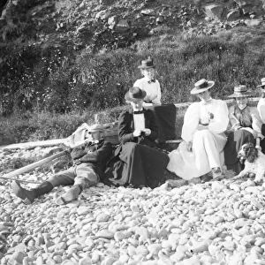 Family group on Newgale beach, Pembrokeshire, West Wales